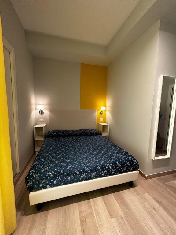 Postel nebo postele na pokoji v ubytování Hotel Sissi