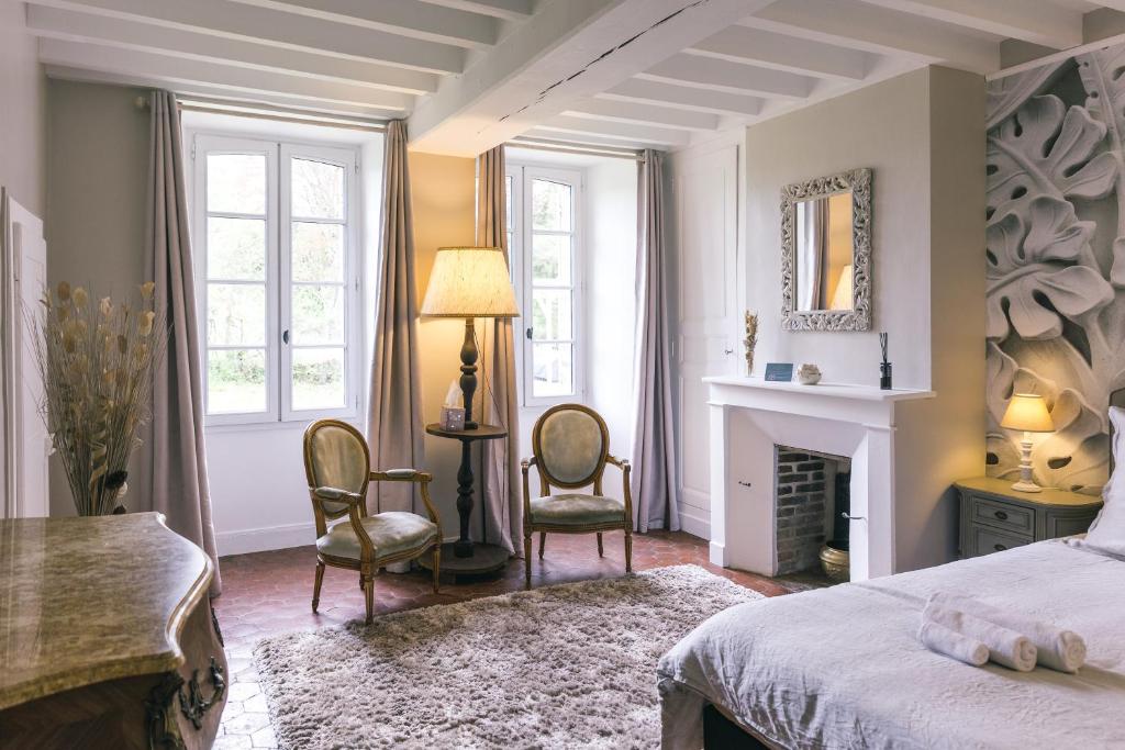Postel nebo postele na pokoji v ubytování Maison d'hôtes le Prieuré du Preux