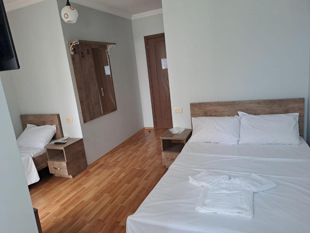 Postel nebo postele na pokoji v ubytování Hotel Zundaga