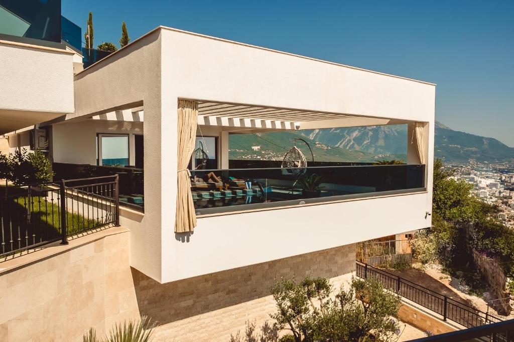 a house with a view of the mountains at THE VIEW Premium Villas in Bar