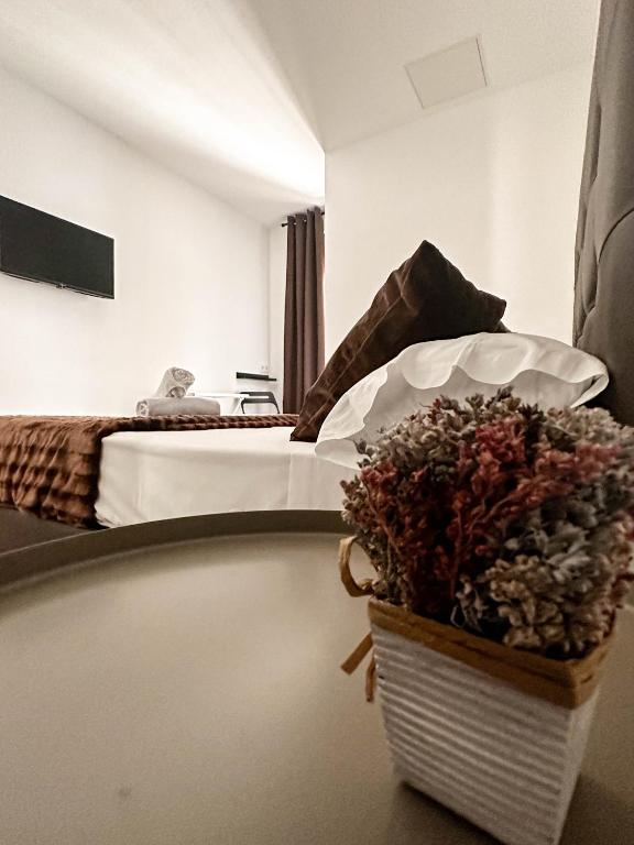 Postel nebo postele na pokoji v ubytování Hostal Arenal Madrid