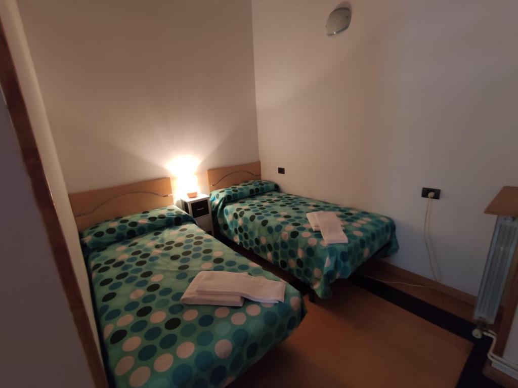 Postel nebo postele na pokoji v ubytování Inmocyma Soldorau-Benasque