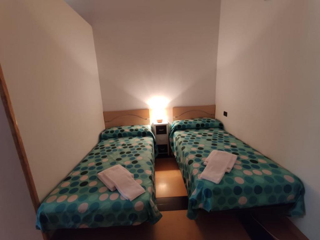 Postel nebo postele na pokoji v ubytování Inmocyma Soldorau-Benasque