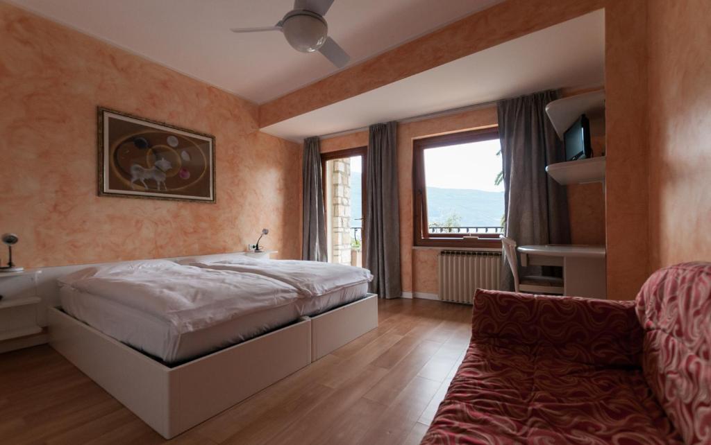 Postel nebo postele na pokoji v ubytování Hotel Forbisicle