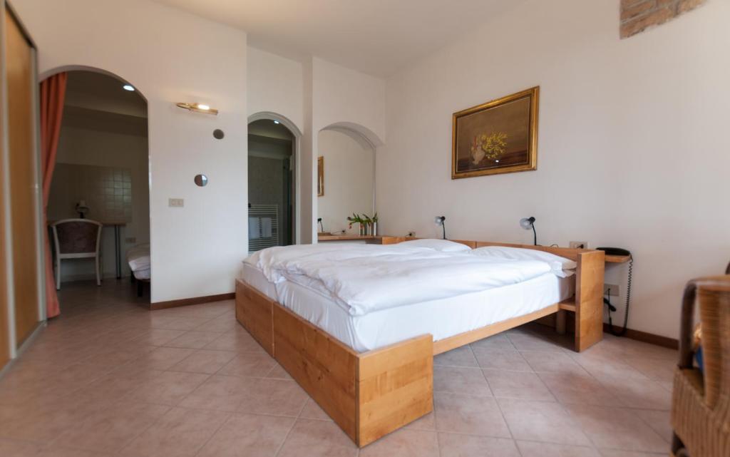 Postel nebo postele na pokoji v ubytování Hotel Forbisicle