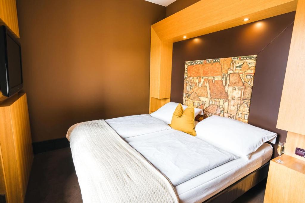 Postel nebo postele na pokoji v ubytování Hotel Zlaty Andel