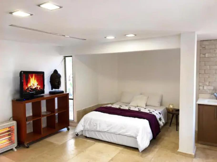 Una cama o camas en una habitación de Nave's Relax Home