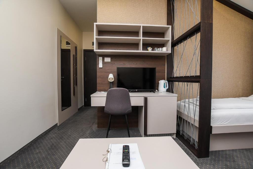 Postel nebo postele na pokoji v ubytování Atrijum Apartments and Rooms