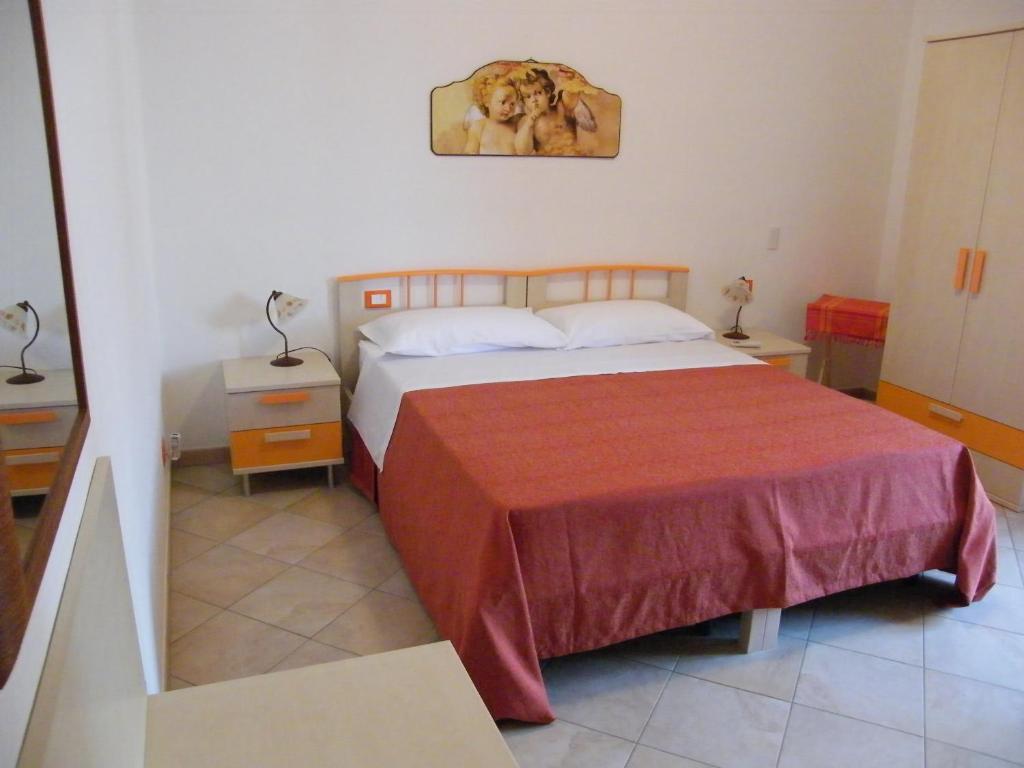 Postel nebo postele na pokoji v ubytování Oasi del Sud