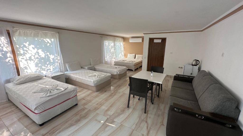 Postel nebo postele na pokoji v ubytování Kiriş Garden Hotel