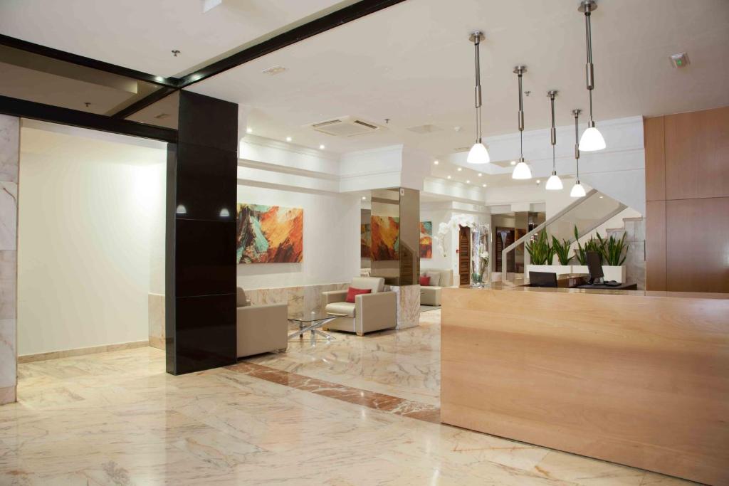 a lobby of a building with a reception desk at Hotel Principe Paz in Santa Cruz de Tenerife