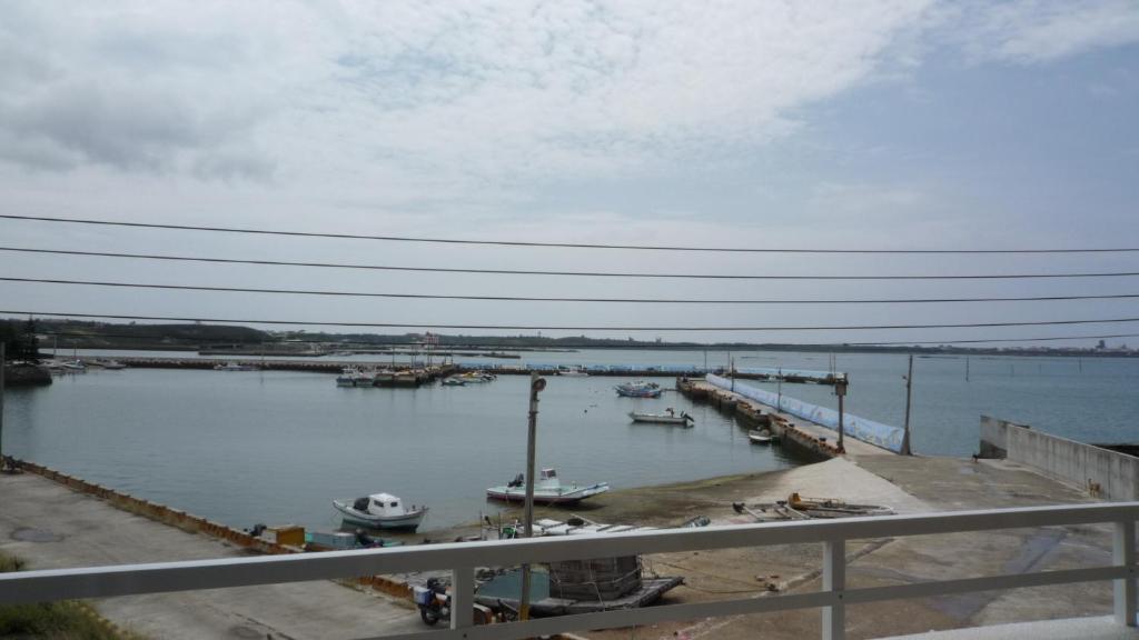 a view of a harbor with boats in the water at See Starsea Guest House in Magong