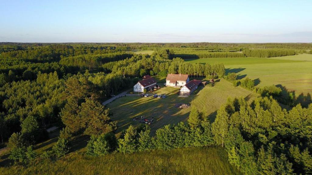 an aerial view of a large house on a field at Gdzie diabeł mówi dobranoc in Pisz