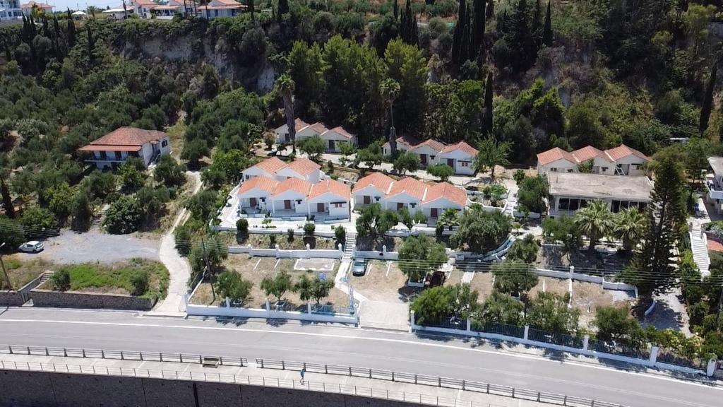 arial view of a suburb with houses and a road at ARTAKi R APARTMENTS in Koroni