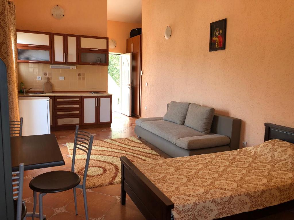 Kuchyň nebo kuchyňský kout v ubytování Apartments Delcheva