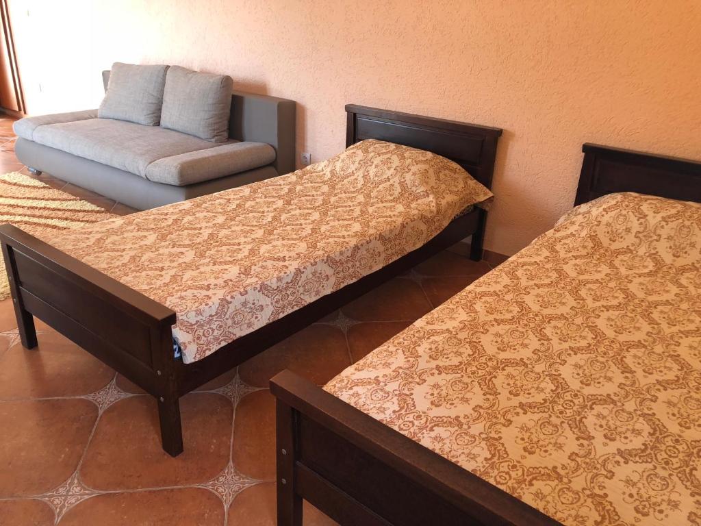 Postel nebo postele na pokoji v ubytování Apartments Delcheva