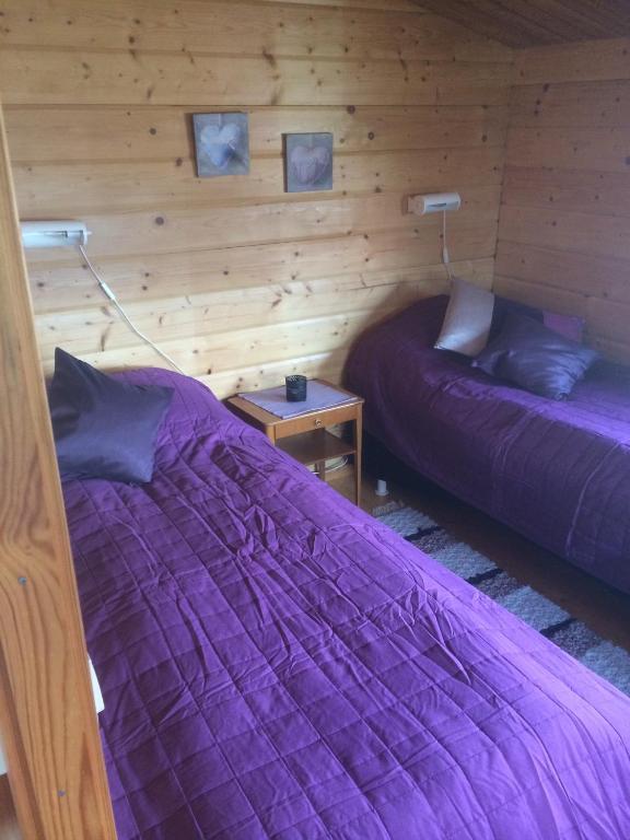 Postel nebo postele na pokoji v ubytování Gripenbergs Gårdsbutik