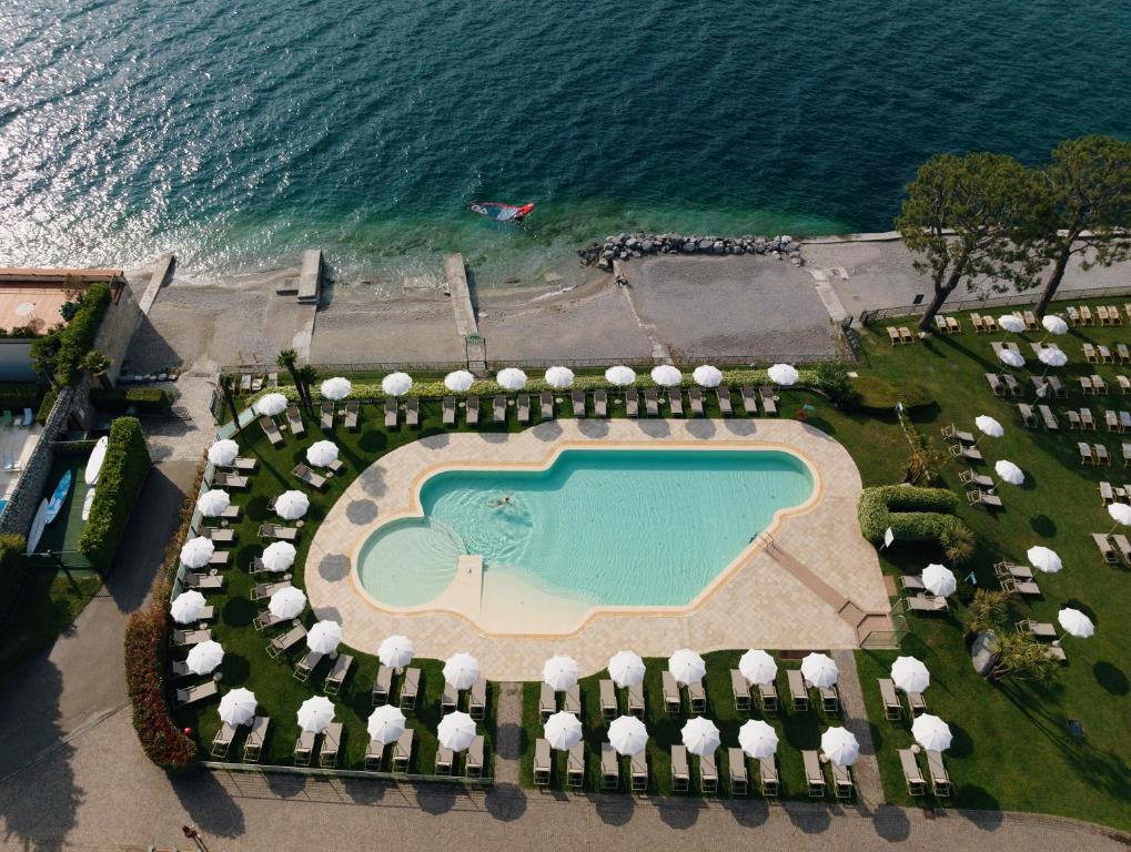 an aerial view of a resort with a swimming pool at Hotel Du Lac in Limone sul Garda