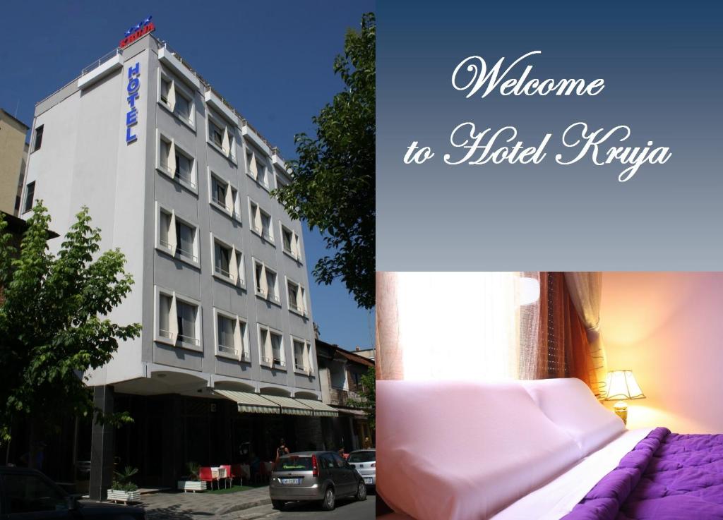 un hotel con cama frente a un edificio en Kruja Hotel, en Tirana