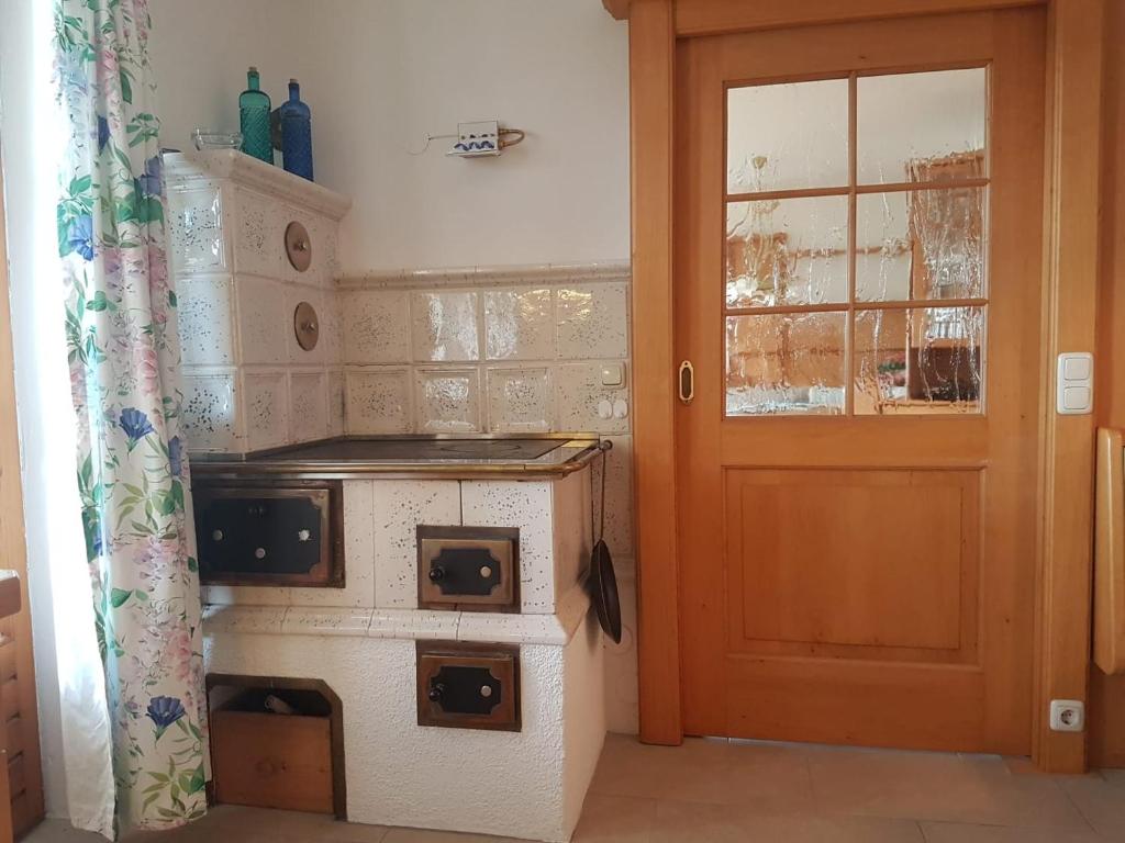 Kuchyň nebo kuchyňský kout v ubytování Wunderschöne Ferienwohnung mit Seeblick