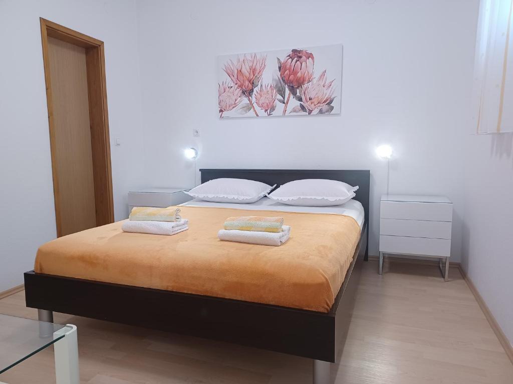 Posteľ alebo postele v izbe v ubytovaní MG Ravlic Apartments