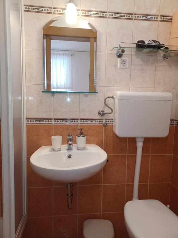 Kúpeľňa v ubytovaní MG Ravlic Apartments