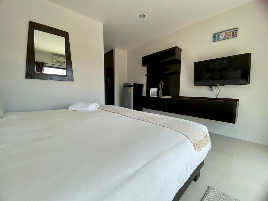 TV a/nebo společenská místnost v ubytování SD Residence I Naiyang Beach I HKT Airport