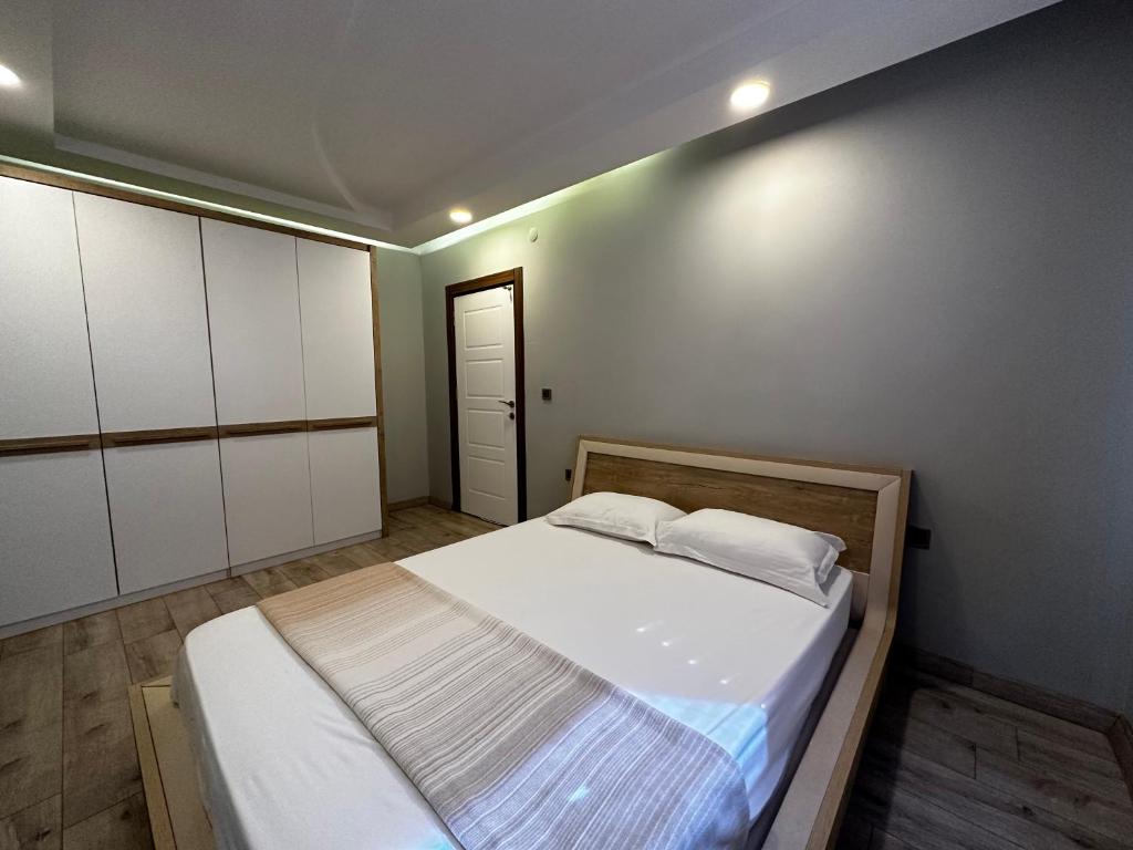 Postel nebo postele na pokoji v ubytování BEYAZ SUiTES