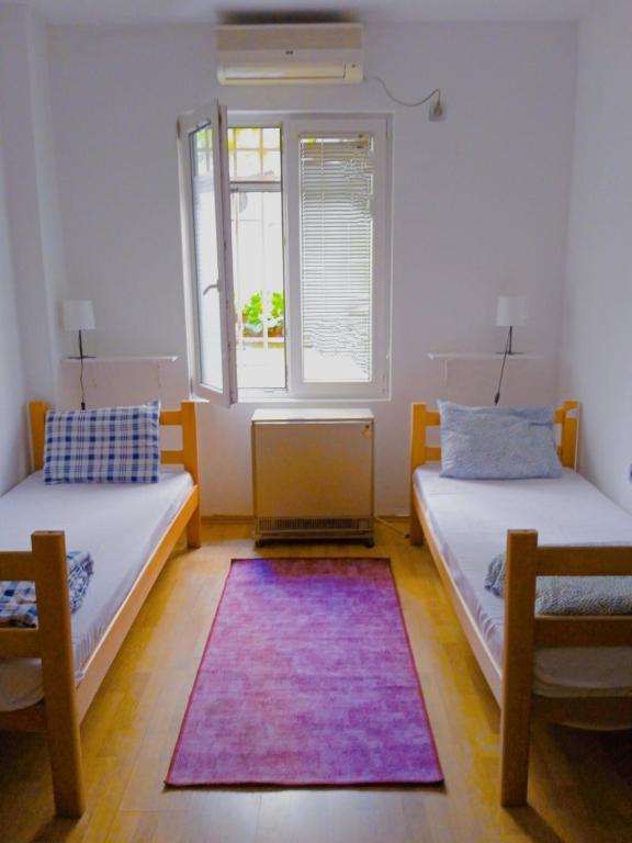 Postel nebo postele na pokoji v ubytování Jasmin