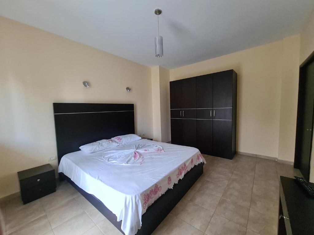 Postel nebo postele na pokoji v ubytování Hotel Kukesi