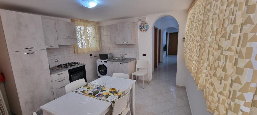 Kuchyň nebo kuchyňský kout v ubytování La casa del Vescovo