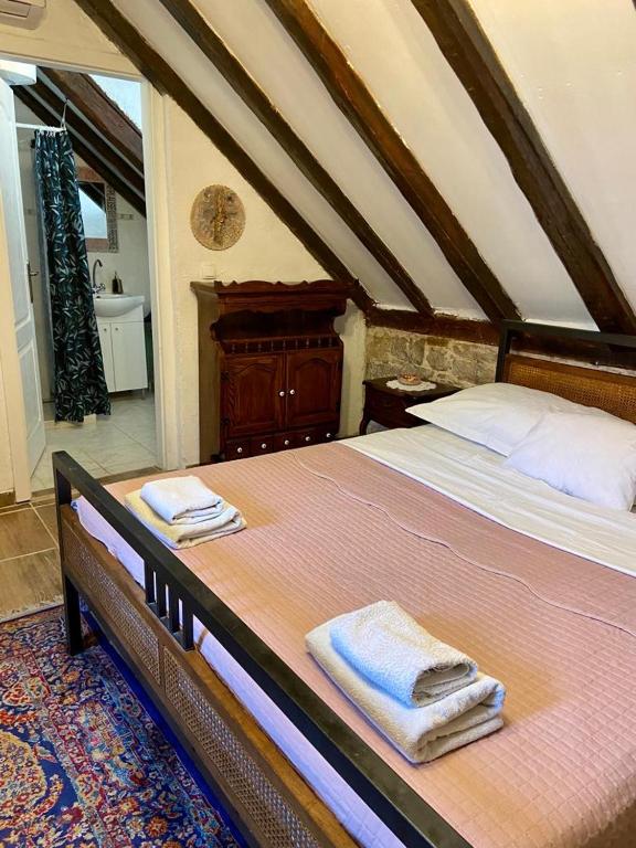 Postel nebo postele na pokoji v ubytování Kovacic Rooms