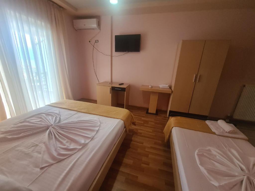 Postel nebo postele na pokoji v ubytování Hotel Kukesi