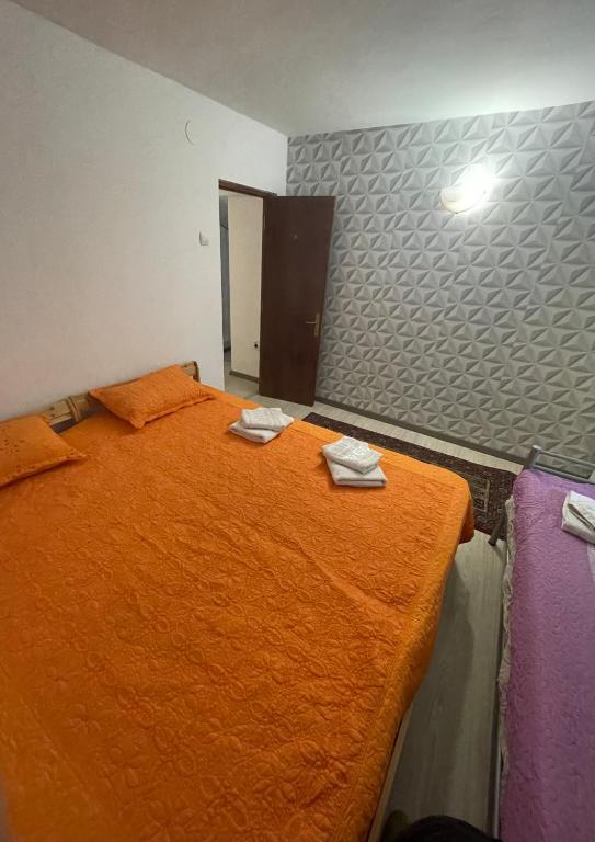 Postel nebo postele na pokoji v ubytování CONSTANTINESCU A.