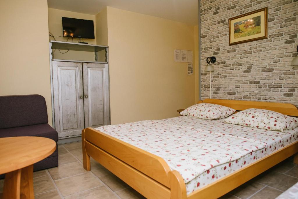Postel nebo postele na pokoji v ubytování Sobe Tatjana