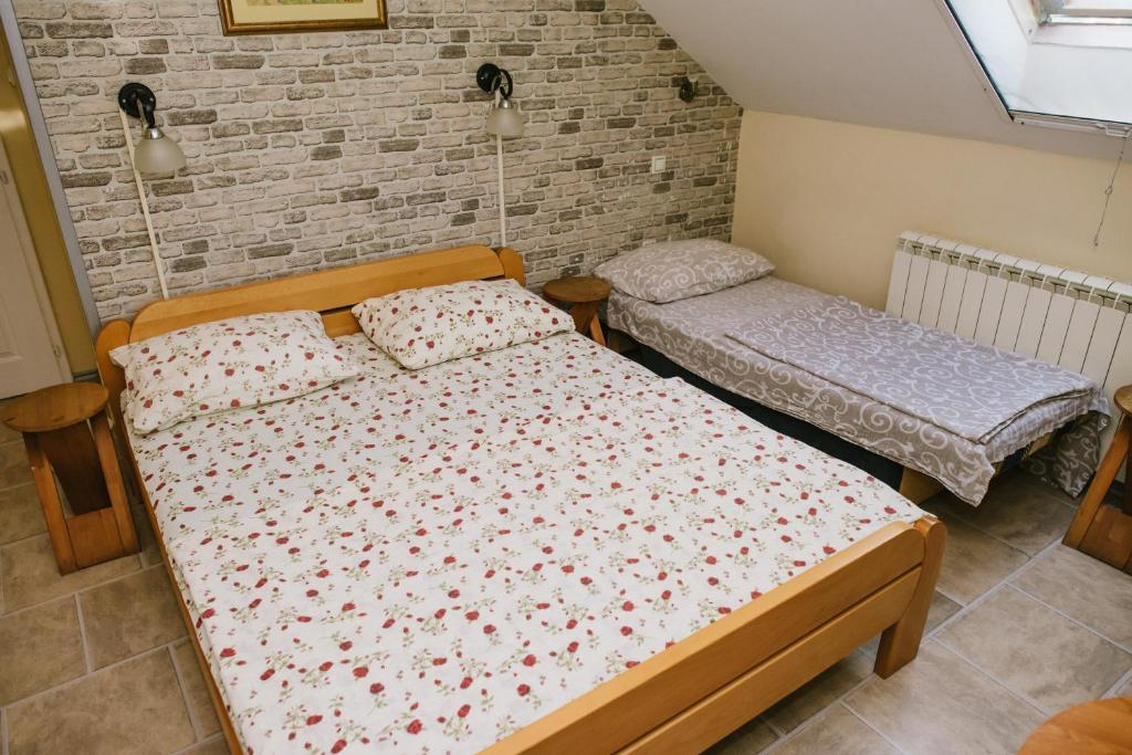 Postel nebo postele na pokoji v ubytování Sobe Tatjana