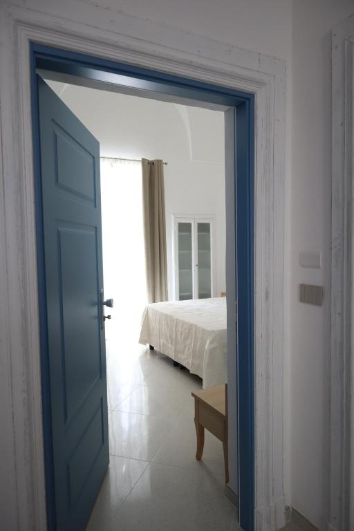 Postel nebo postele na pokoji v ubytování CASA ZIAGO