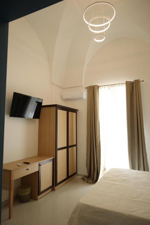 Postel nebo postele na pokoji v ubytování CASA ZIAGO