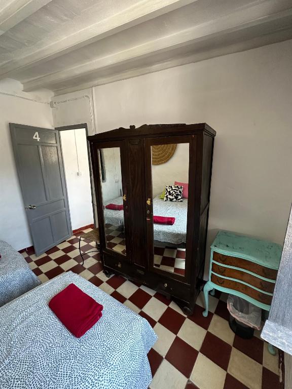 Łóżko lub łóżka w pokoju w obiekcie Villa Beso Casa Rural