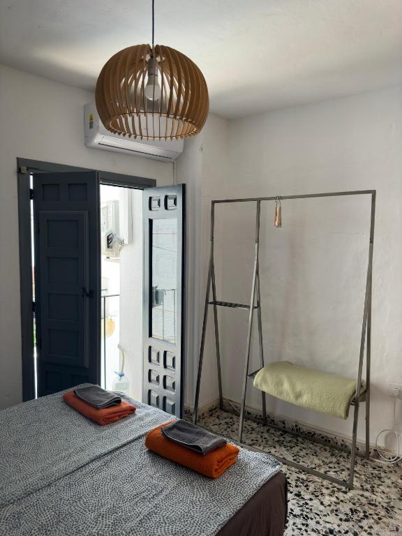 Łóżko lub łóżka w pokoju w obiekcie Villa Beso Casa Rural