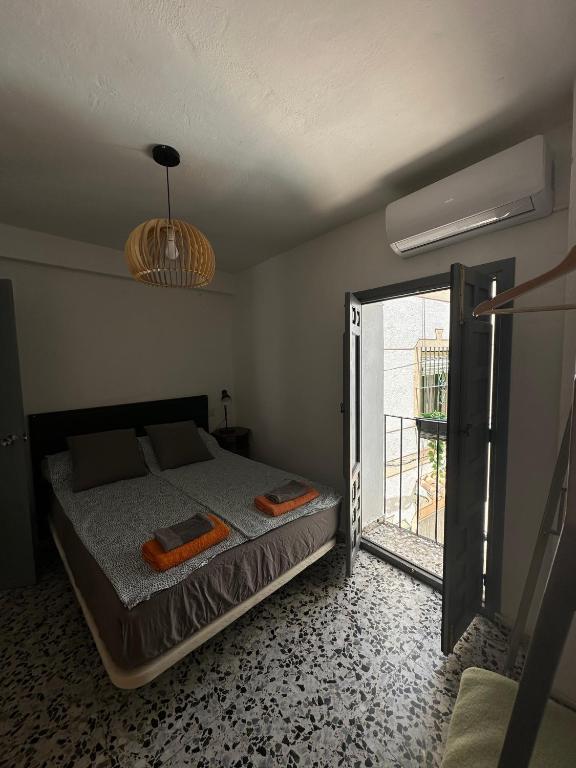Łóżko lub łóżka w pokoju w obiekcie Villa Beso Casa Rural