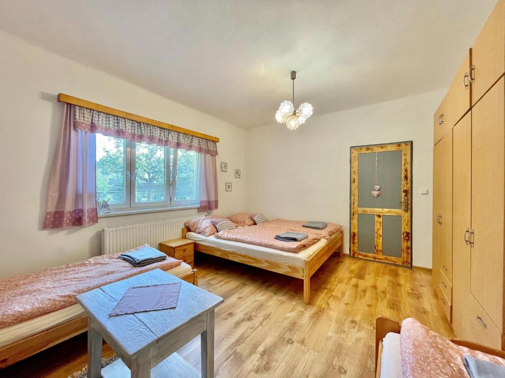 Postel nebo postele na pokoji v ubytování Chalupa U Josefa