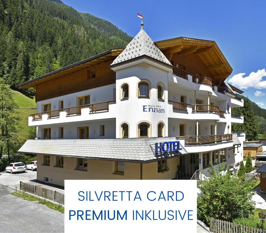 a building with the words silvretta card premium insurance at Hotel Enzian Paznaun in See