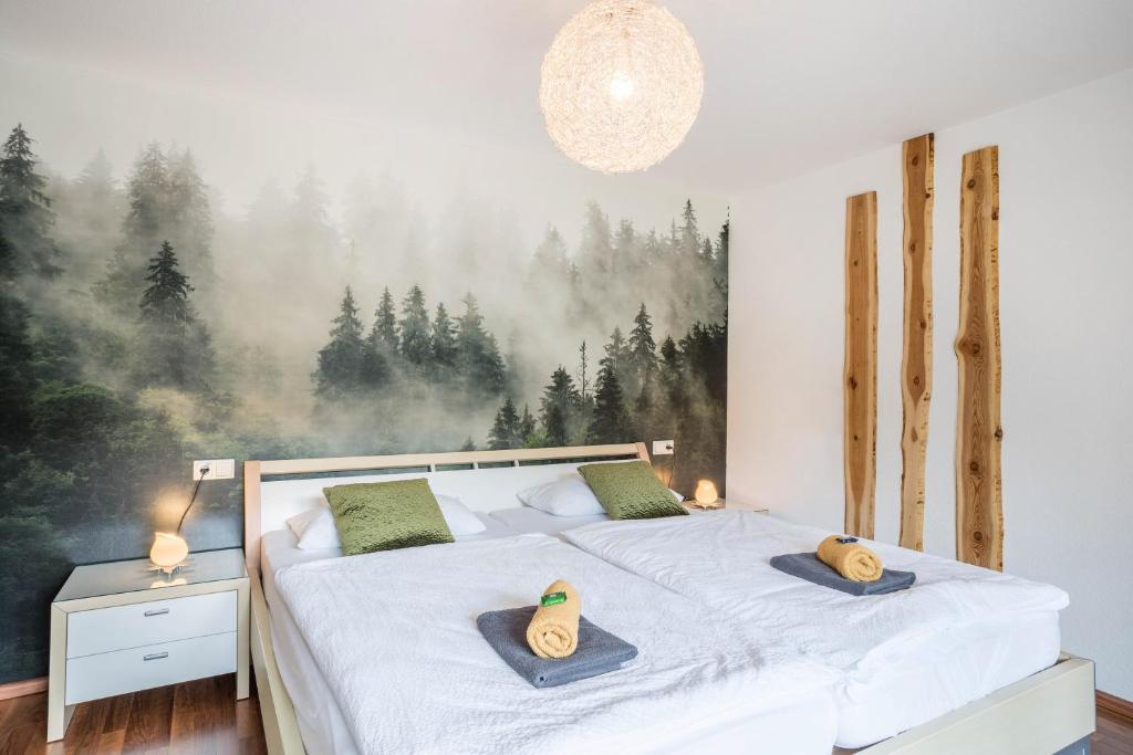 Postel nebo postele na pokoji v ubytování Ferienwohnung Hohfelsenblick