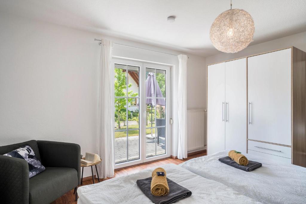 Postel nebo postele na pokoji v ubytování Ferienwohnung Hohfelsenblick