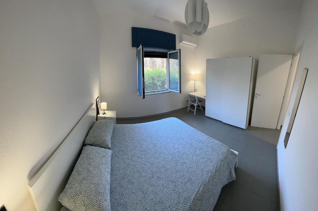 Ένα ή περισσότερα κρεβάτια σε δωμάτιο στο La casa del nonno - Villapiana