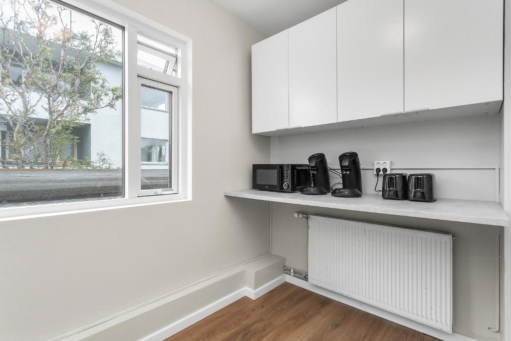 Kuchyň nebo kuchyňský kout v ubytování Reykjavík Central Guesthouse