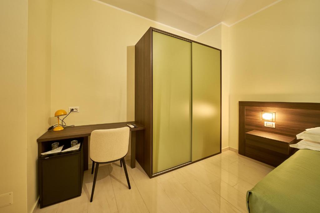 Letto o letti in una camera di B&B Torre Talao