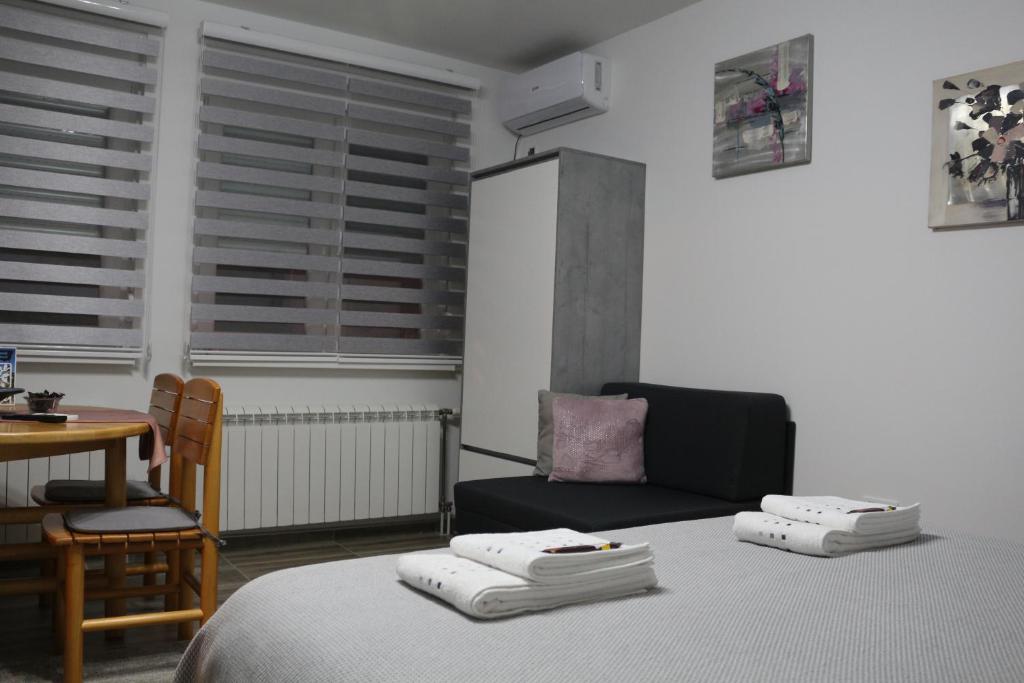 Postel nebo postele na pokoji v ubytování Sokak 8