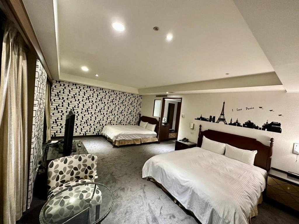 Postel nebo postele na pokoji v ubytování 喜客商旅 Seeker Hotel - Sanchong